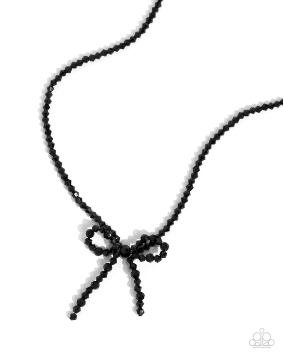 Somebody I Used to BOW - Black

P2RE-BKXX-484XX
Infused along an invisible string, a collection of faceted, reflective black beads loop and curl into a beautiful bow that rests along the collar for a refined centerpiece. Features an adjustable clasp closu